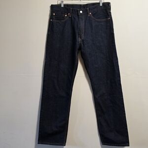 Levis 505 regular fit dark mid rise straight leg jeans